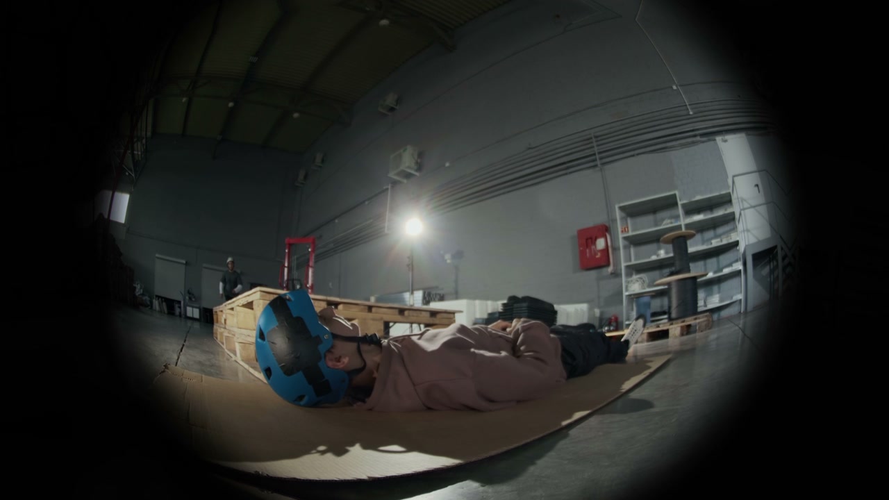 Fisheye Rollerblader Stunt Over Person