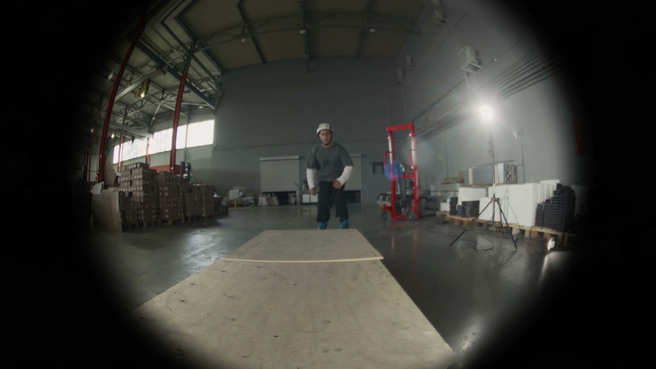 Fisheye Rollerblader Jumps Over BMX Bike