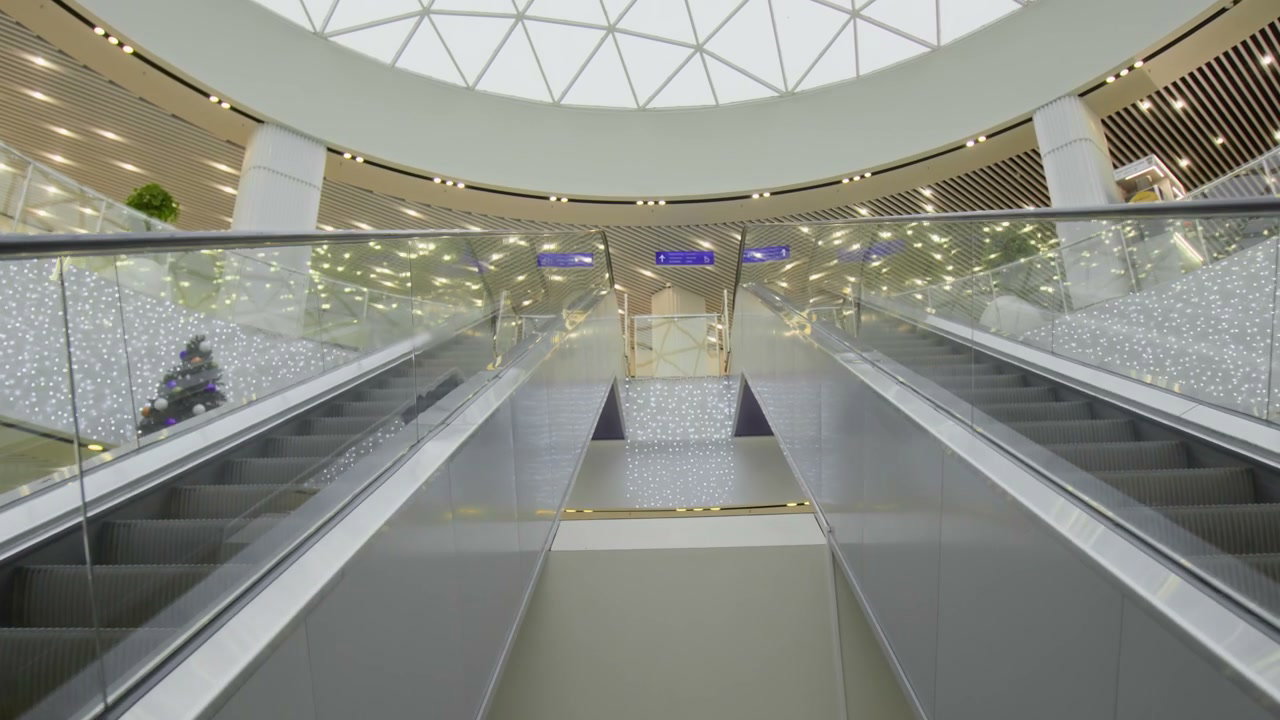 Empty Escalators in Modern Shopping Mall