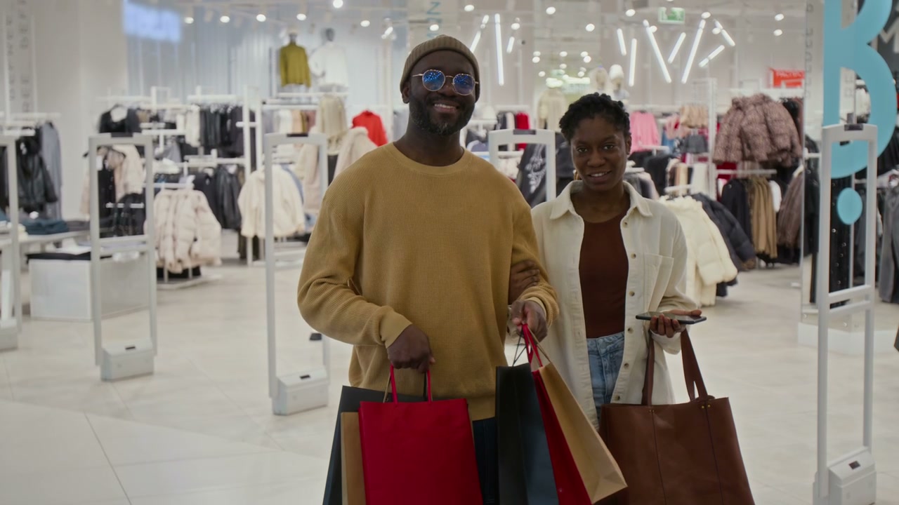 Happy African American Couple Posing in Store