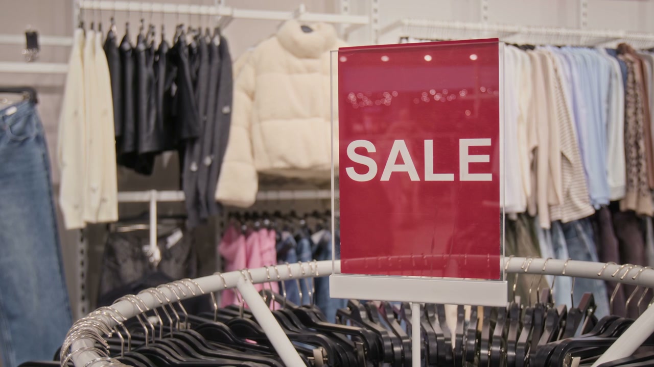 Sale Sign in a Clothing Store