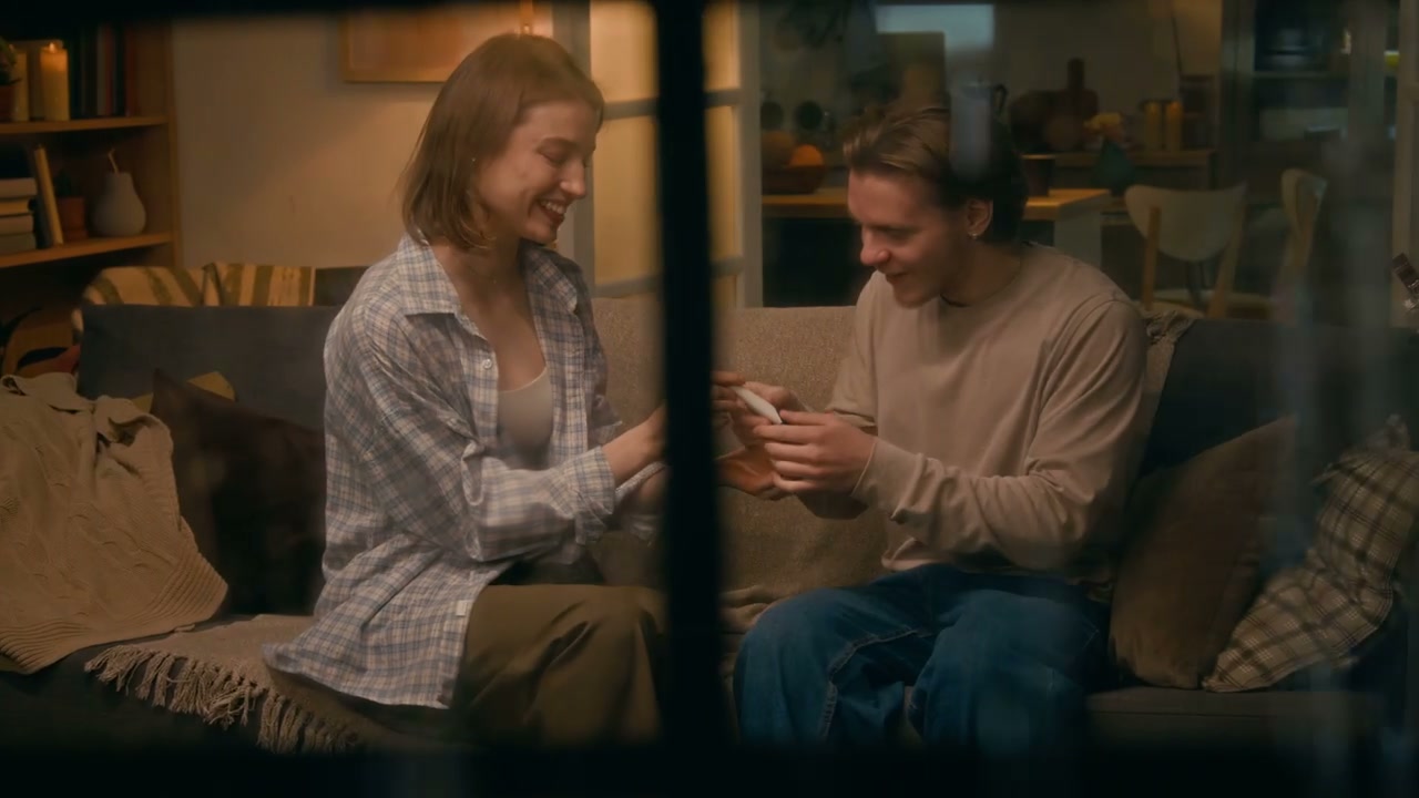 Happy Couple Reacting to Pregnancy Test
