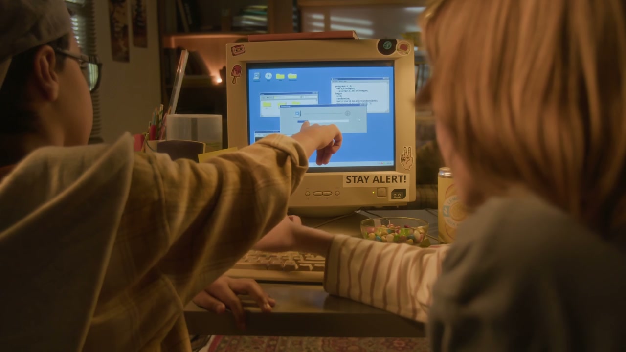 Two Kids Using Retro Computer