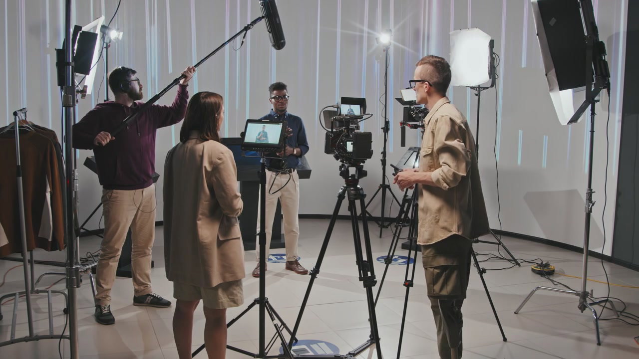 Film Crew Working with Cameraman with Prosthetic Leg