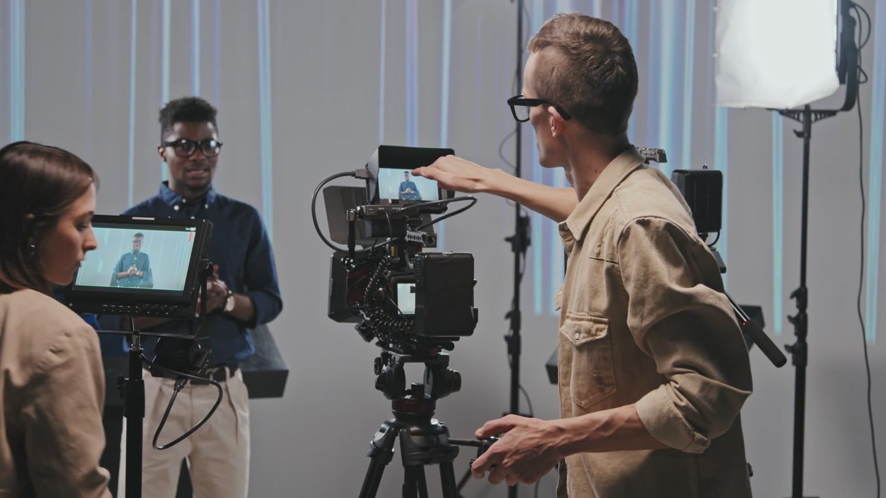 Film Crew Working on Video Production in Studio