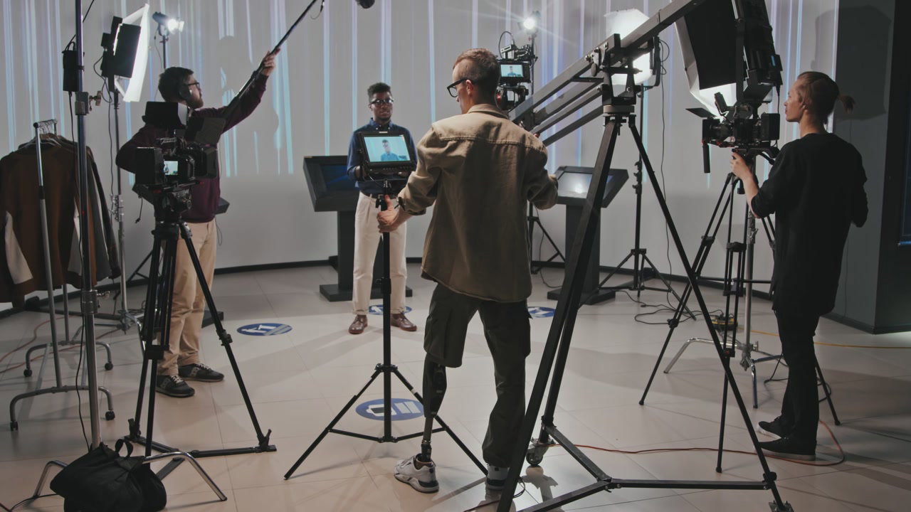 Film Production Crew Working in Studio