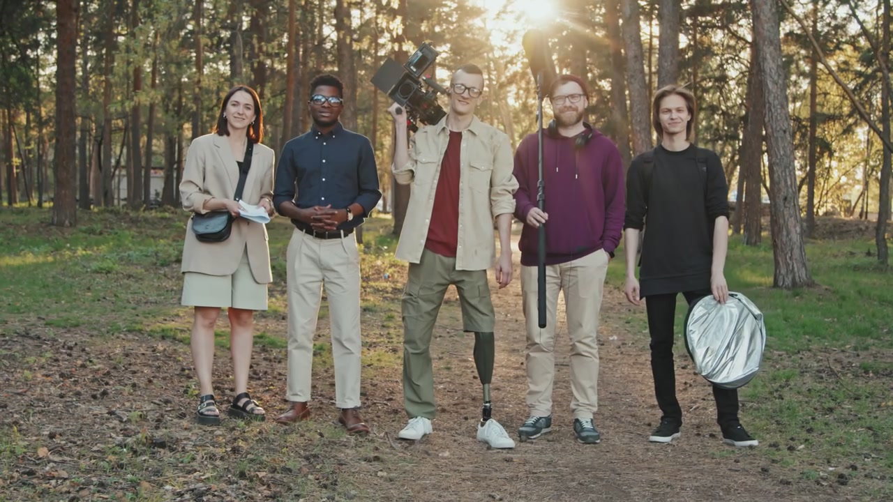 Film Crew with Prosthetic Leg Cameraman in Forest