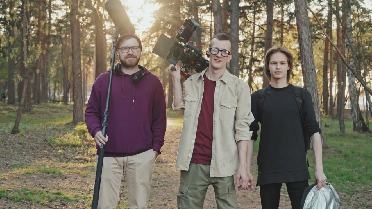 Professional Film Crew Posing in Forest