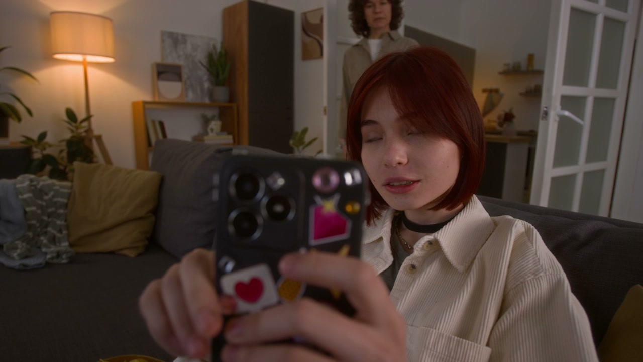 Mother Takes Phone From Teen Daughter