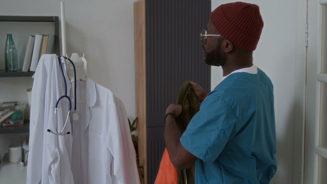 Doctor Preparing For Lunch Break In Clinic