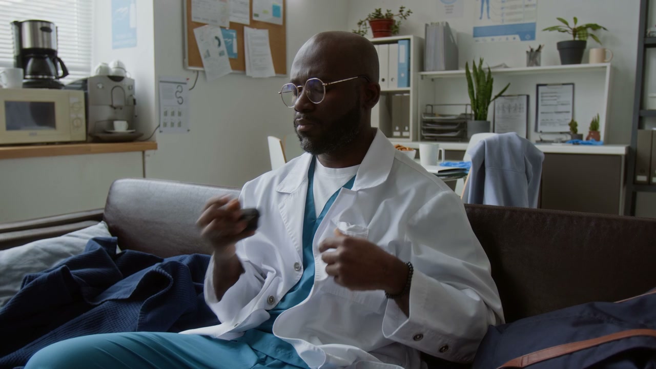 Stressed Doctor Resting in Break Room