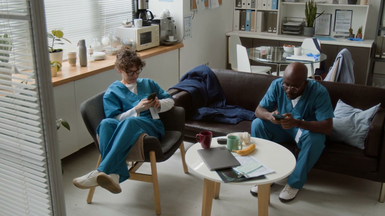 Medical Colleagues on Break Using Phones