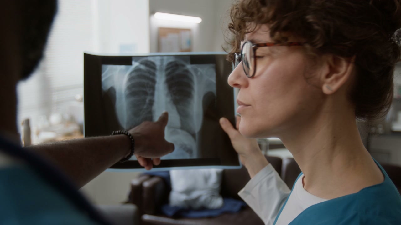 Medical Professionals Analyzing Chest X-ray