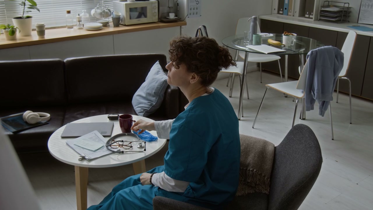 Healthcare Worker Resting During Break