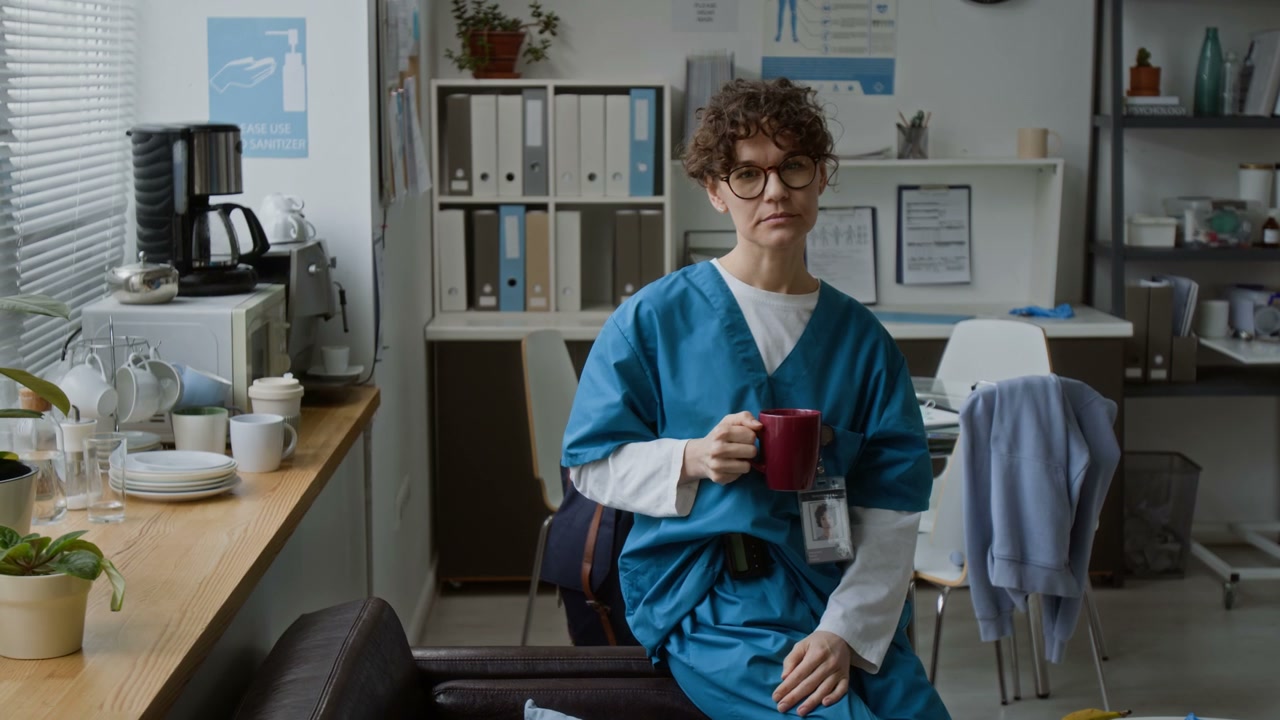 Medical Professional on Break with Coffee