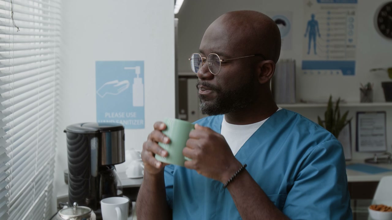 Tired Doctor on Coffee Break