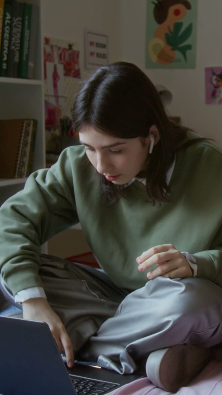 Young Woman Making Heart Gesture on Video Call
