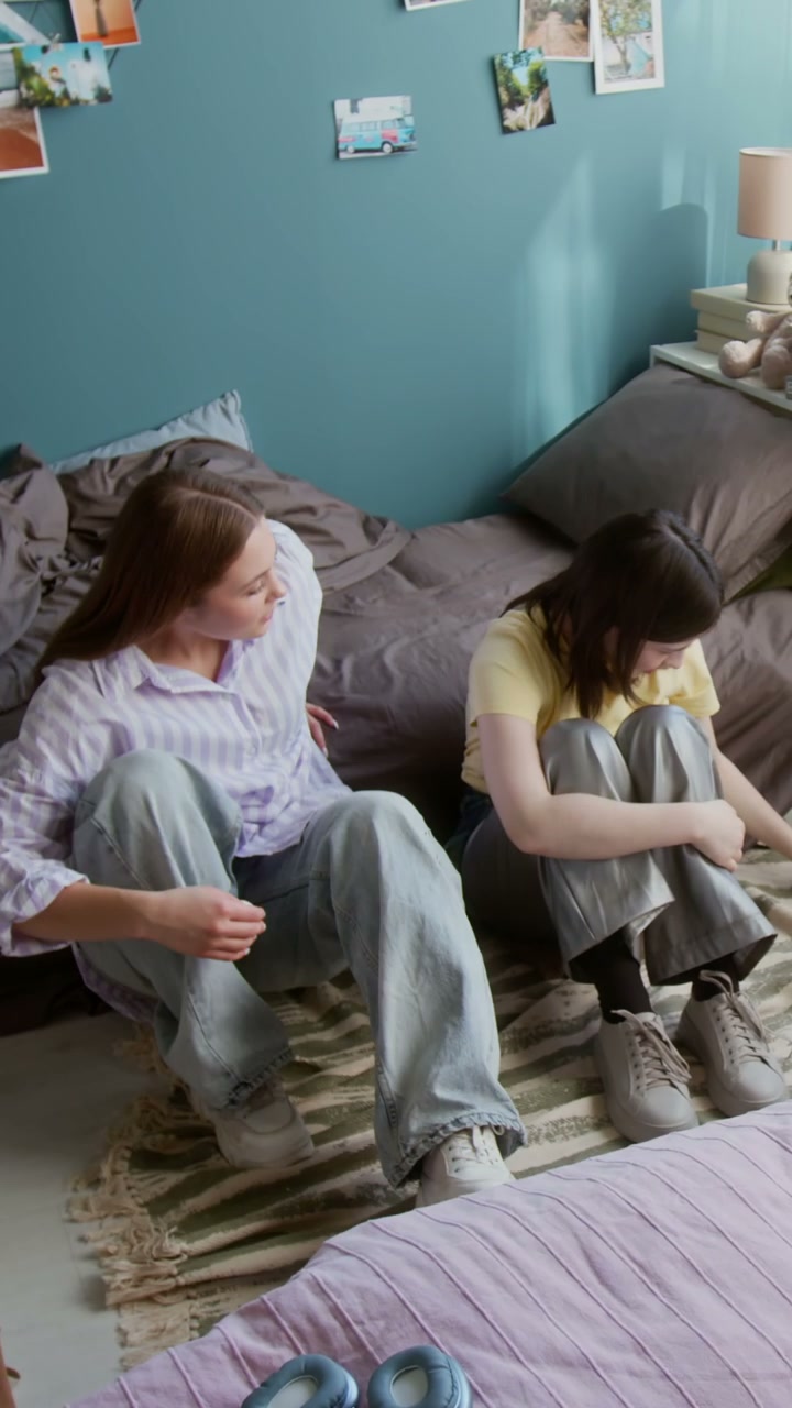 Friend Comforting Crying Teenager