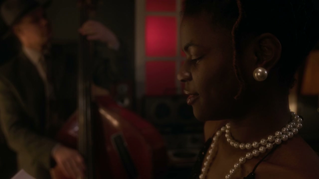 Jazz Singer with Pearl Necklace Reading Music