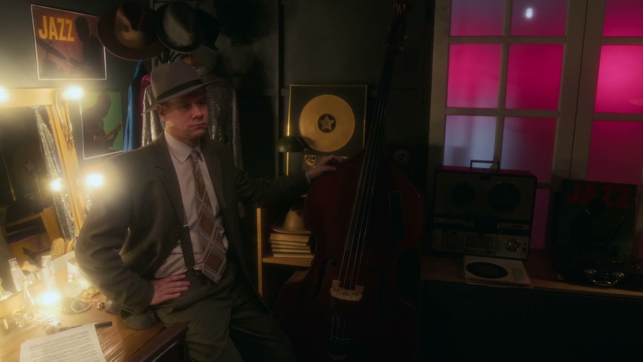 Vintage Jazz Bassist Posing Backstage