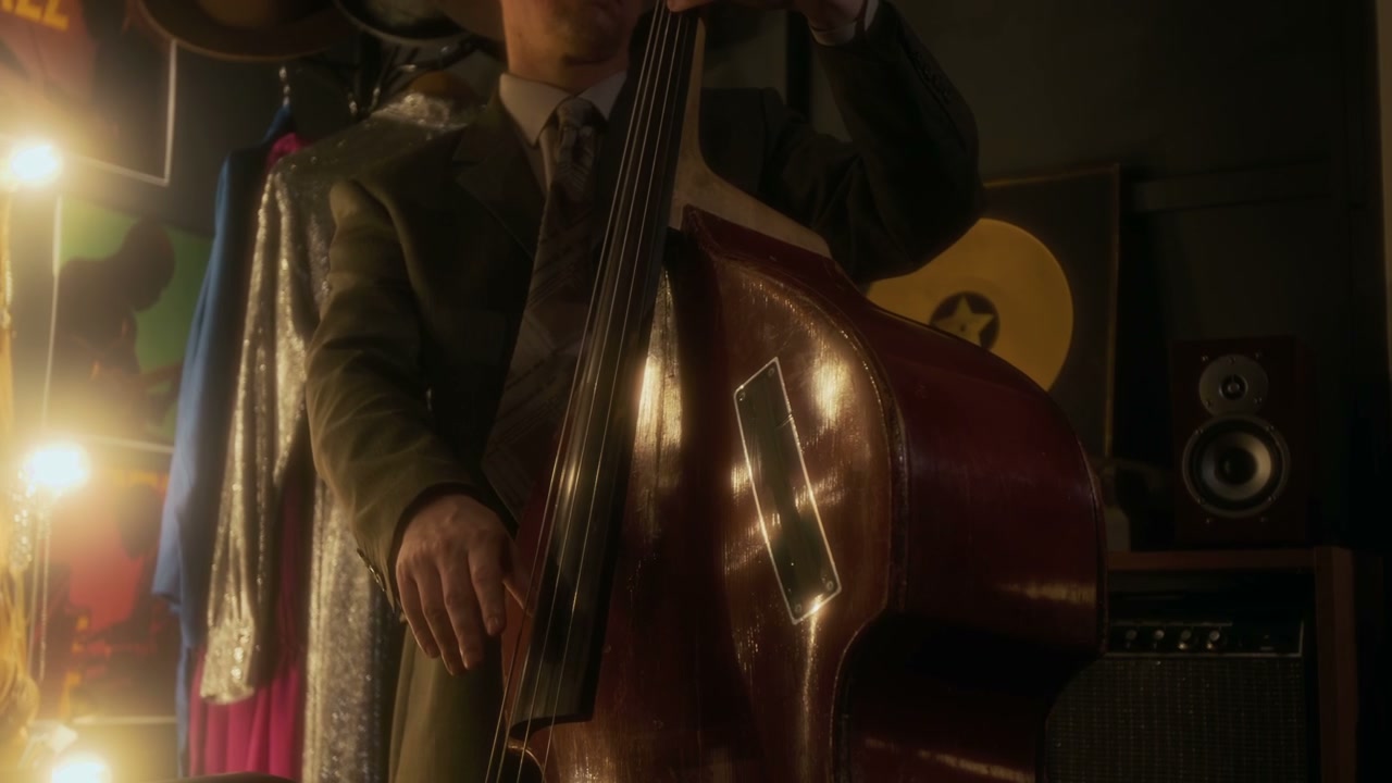 Musician Playing Upright Bass in Studio