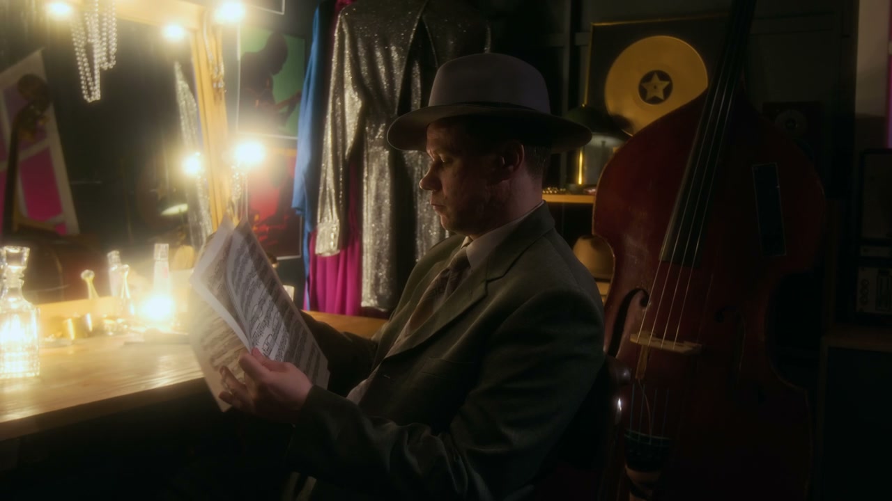 Jazz Musician Reading Sheet Music Backstage