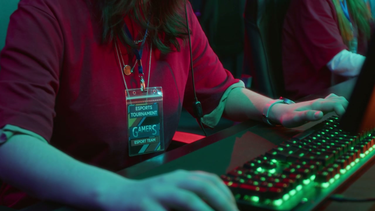 Female Esports Gamer Competing in Tournament