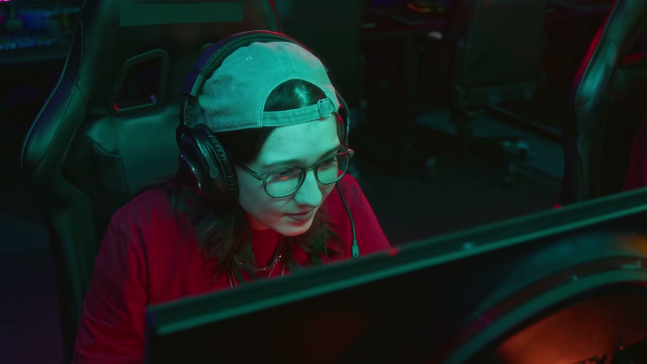 Young Female Gamer Playing in Esports Club