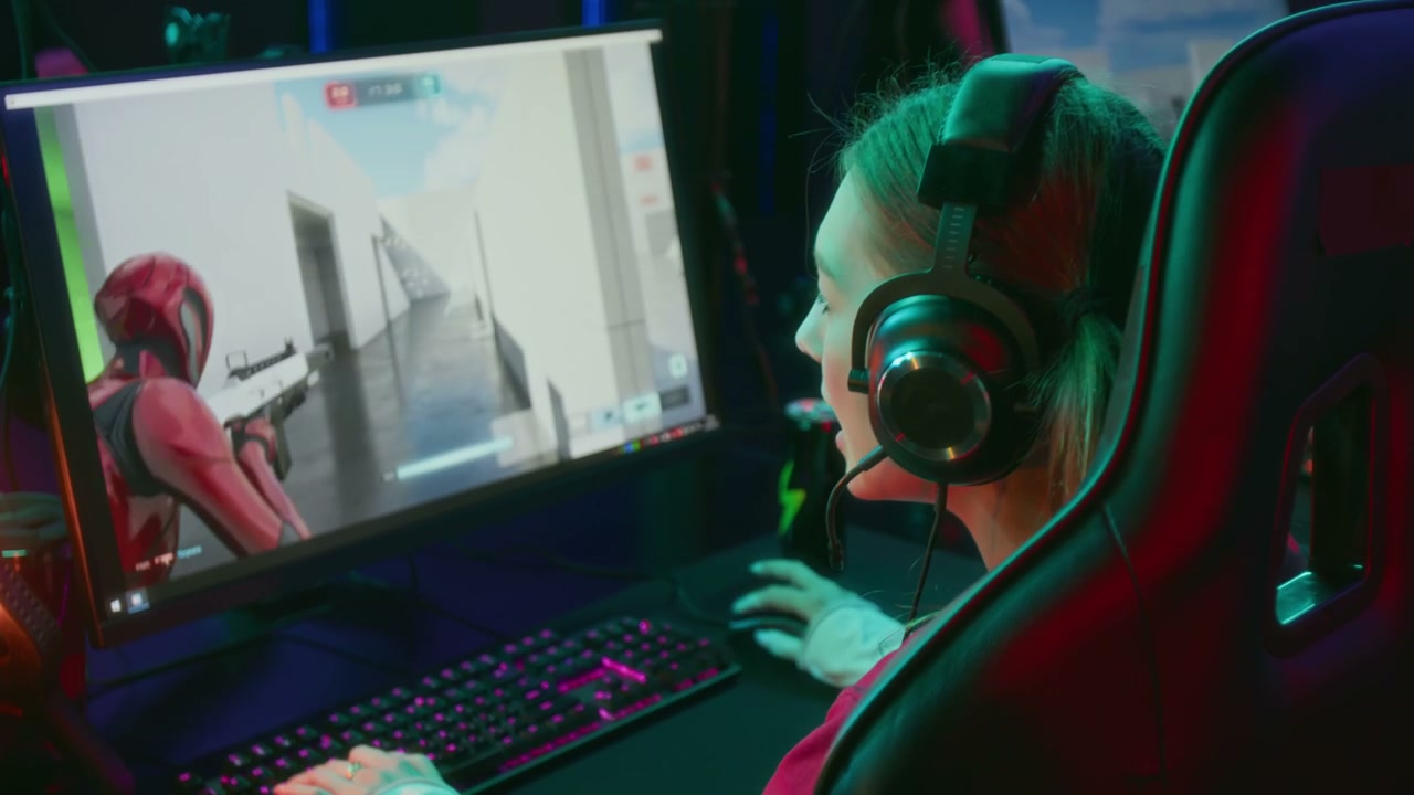 Female Gamer Playing Online Shooter Game