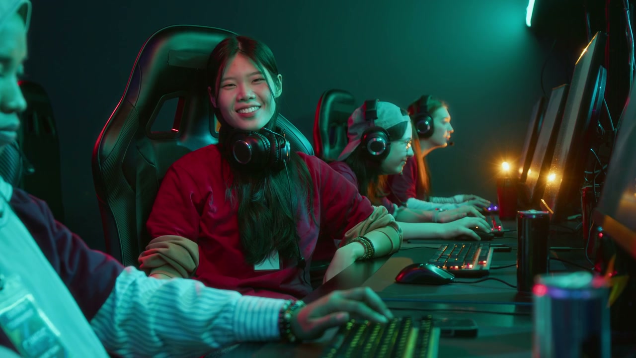 Smiling Female Gamer in Neon Cyberclub