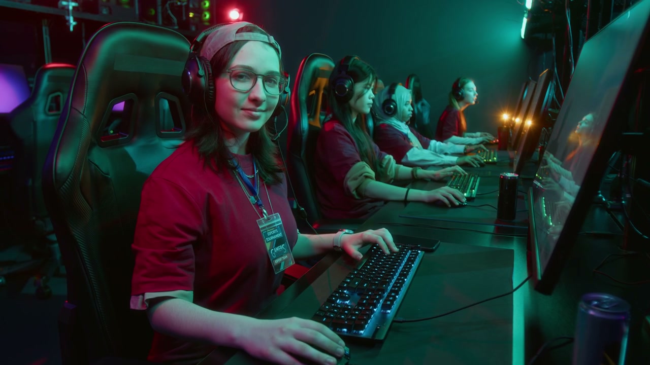 Portrait of Geeky Caucasian Girl Playing Video Game with Teammates in Club