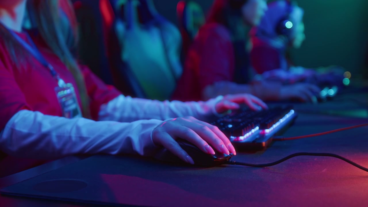 Female Gamer's Hands Playing Esports
