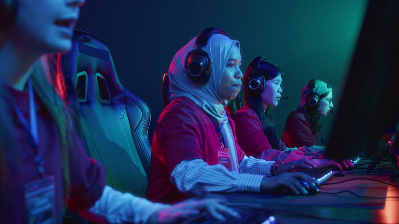 Multiethnic Female Cybersport Team Winning Online Tournament and Cheering