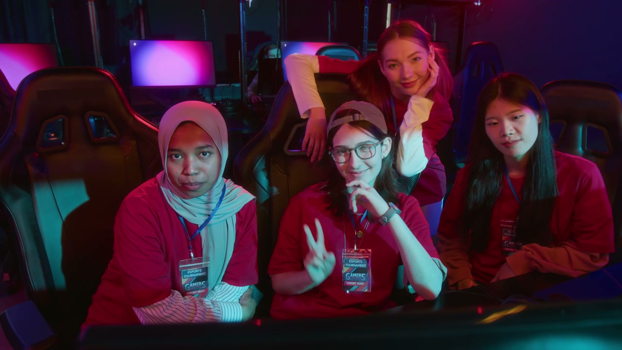 Portrait of Happy Multiethnic Female Gamer Team at Cyberclub