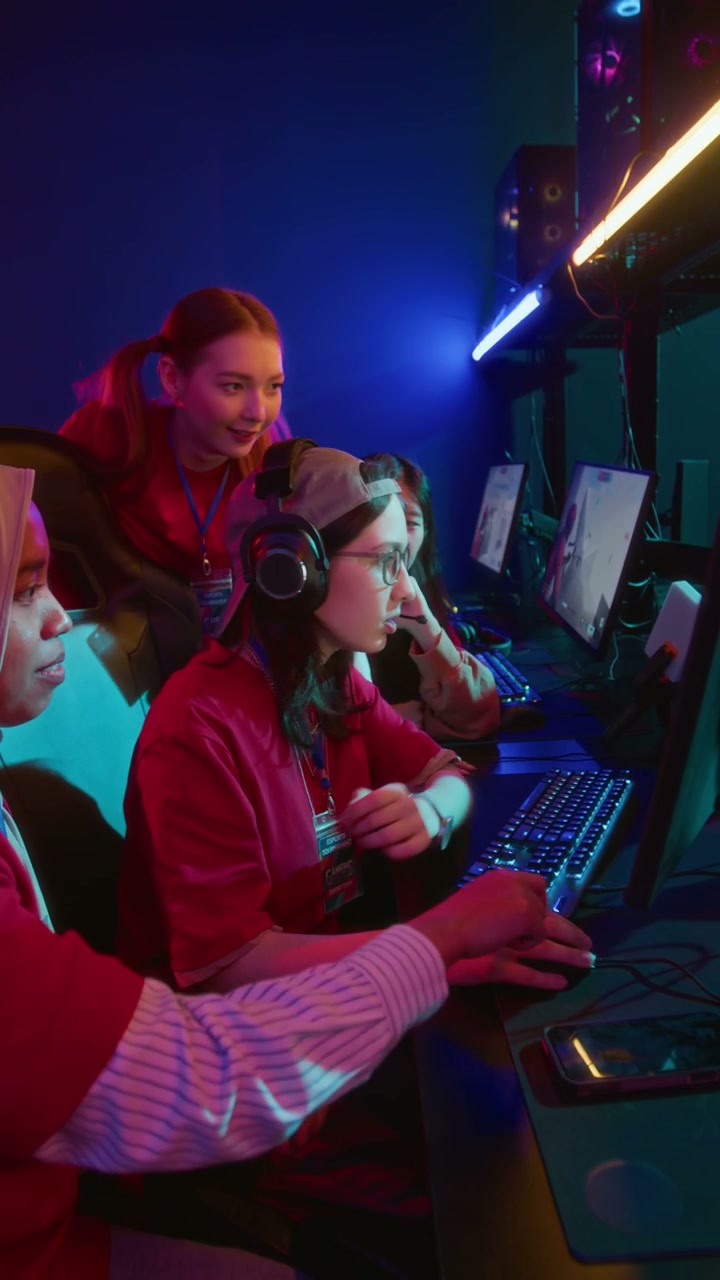 Multiethnic Female Gamers Studying Arena Map in New Video Game Release