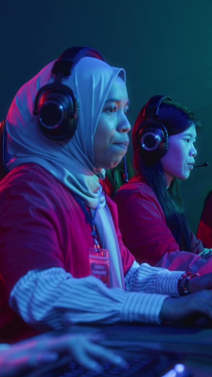 Female Gamer Celebrating Victory at Esports Event