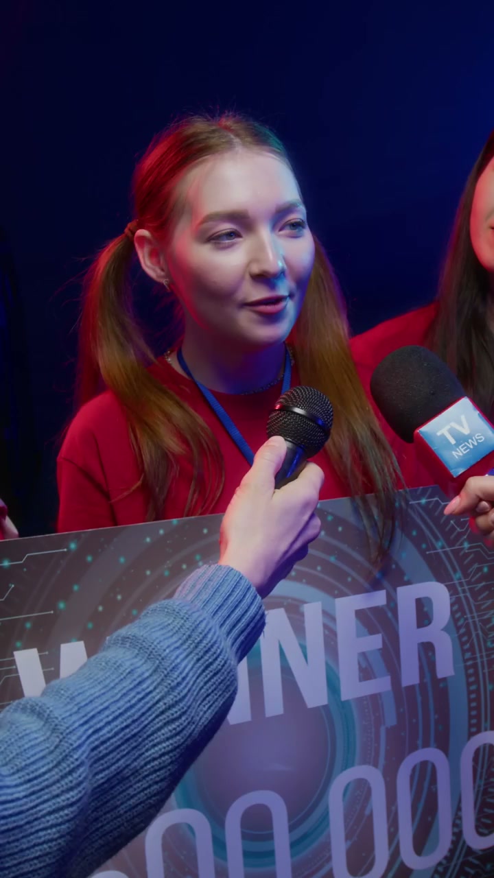 Happy Gamer Woman Interviewed After Victory