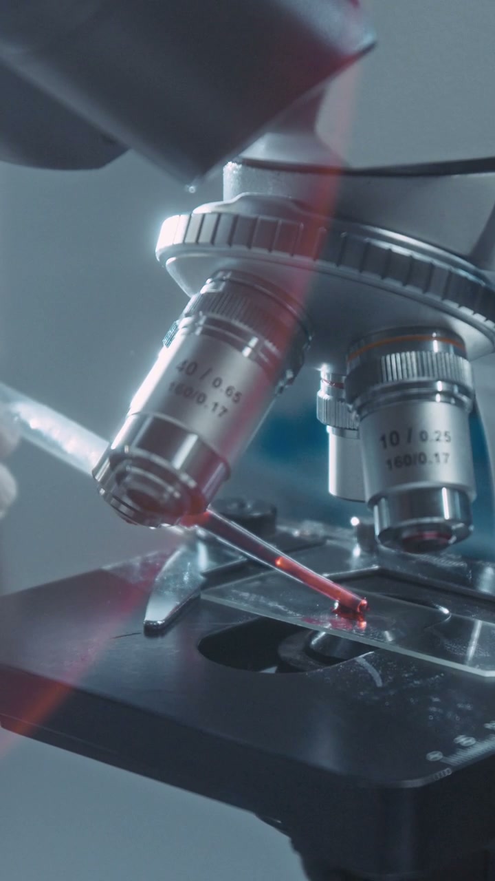 Placing Blood Sample on Microscope Slide