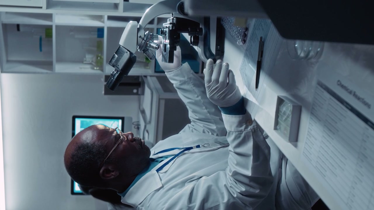 Scientist Examining Samples in Lab