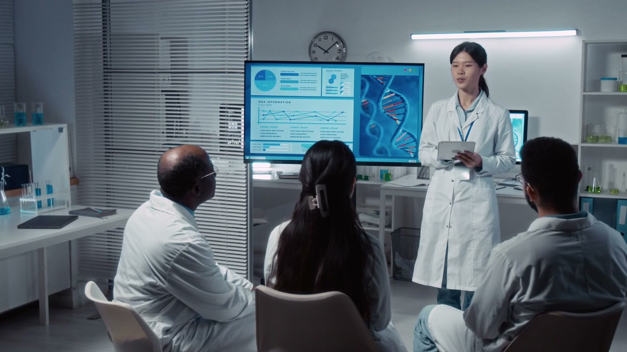 Scientists Discussing DNA Research in Lab