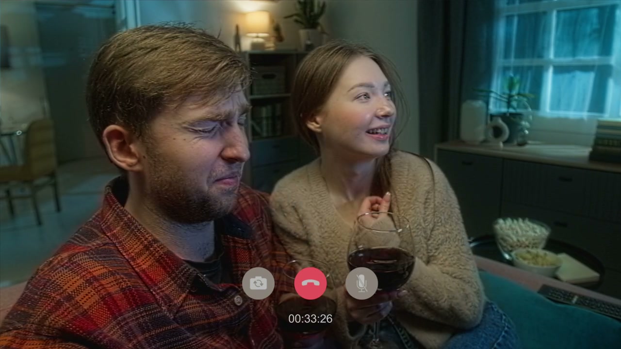 Couple on Video Call Reacting to Horror