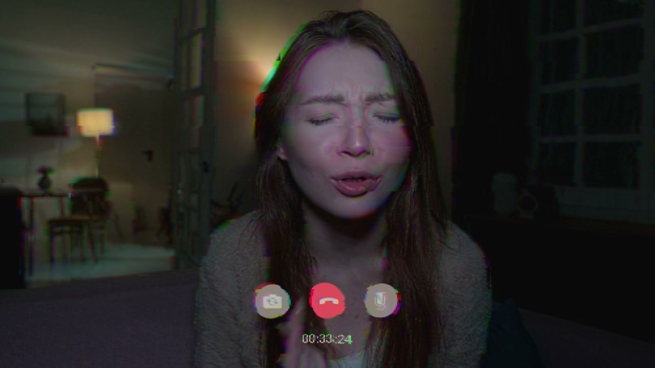 Scared Woman on Glitching Video Call