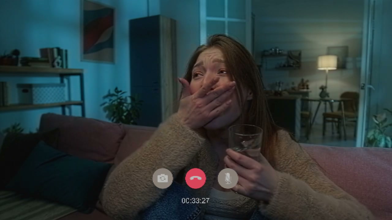 Scared Woman on Video Call with Glitch Effect