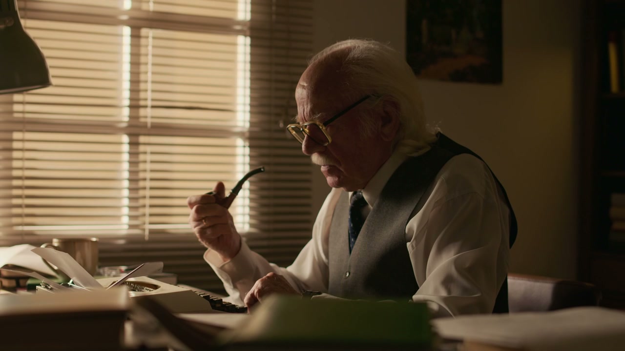 Vintage Writer Typing on Typewriter