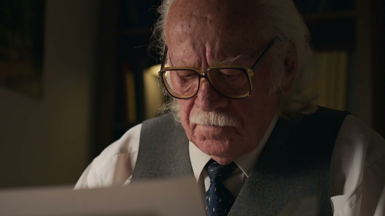 Senior Writer Reviewing Documents