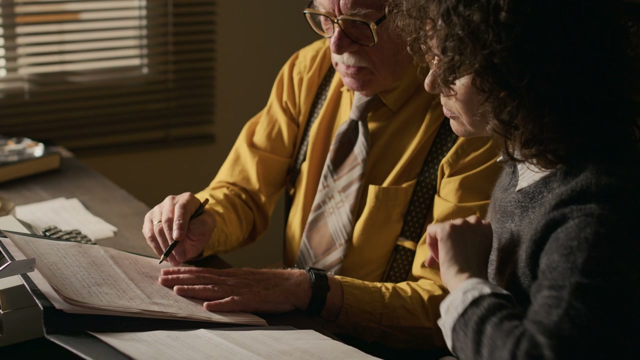 Vintage Writers Reviewing Manuscript