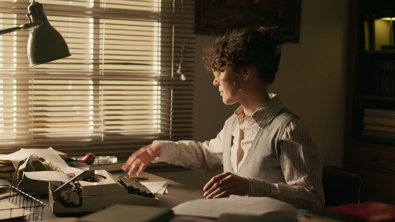 Woman Writer Working at Vintage Desk