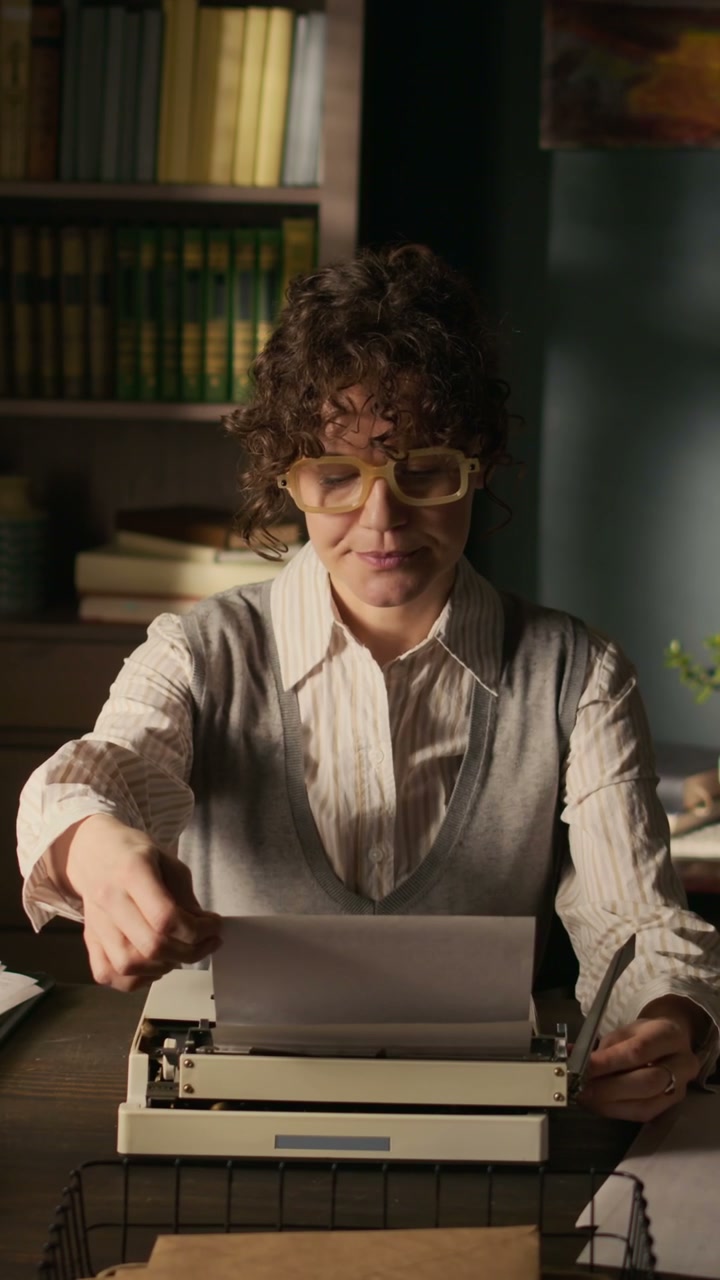 Writer Prepares Vintage Typewriter
