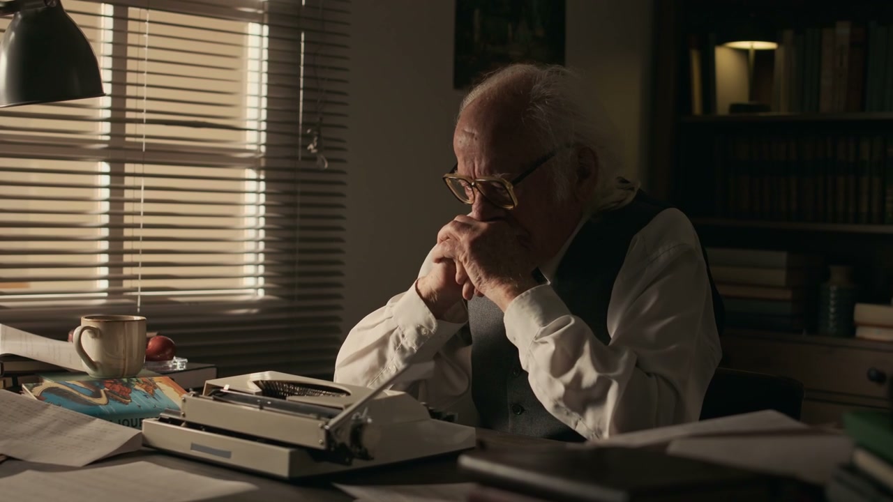 Elderly Writer Reviewing Manuscript