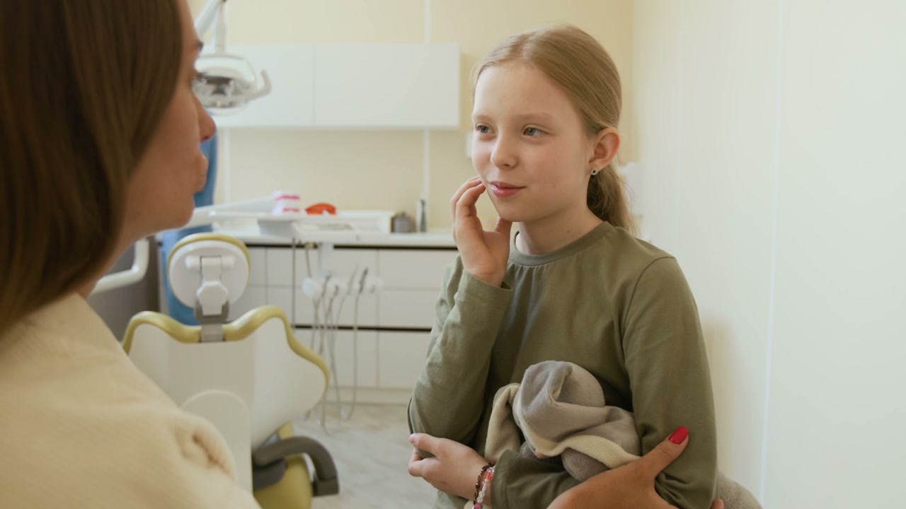 Mother and Daughter Dental Consultation